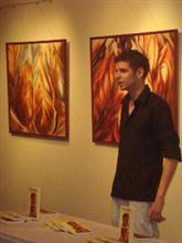 Artist Jake Bullough speaking at opening