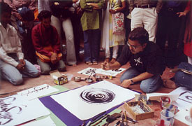 Achyut Palav at Indiaart Gallery for calligraphy demonstration