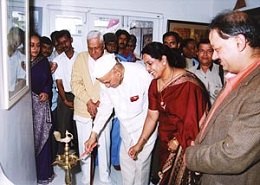 Honorable Dr. Mohan Dharia lighting the lamp