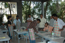 Sculptors working on creating sculptures in ceramics