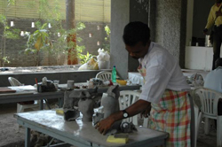Sculptors working on creating sculptures in ceramics