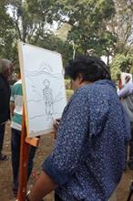 Cartoonist at work at the event