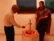 Shri. Deepak Ghare lighting the lamp