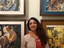 Amita Goswami with her paintings at Indiaart Gallery, Pune