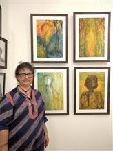 Janaki Anand with her paintings at Indiaart Gallery, Pune