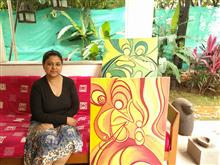 Nupur Sinha with her painting at the second edition of Emerging Artists Show at Indiaart Gallery, Pune