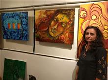 Rupal Buch with her paintings at Indiaart Gallery, Pune