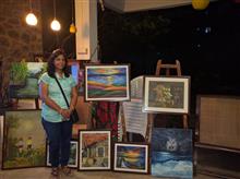 Sudha Srivastava with her paintings at the second edition of Emerging Artists Show at Indiaart Gallery, Pune - 2