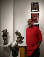 Chandan Roy with his bronze Ganesha sculptures. 