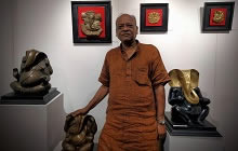 Tapas Sarkar with his bronze Ganesha sculptures. 