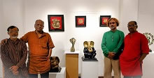 Here is a picture of the sculptors with their creations. 