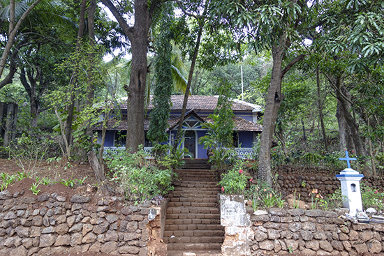 Photograph by Milind Sathe - House with a Blue Cross